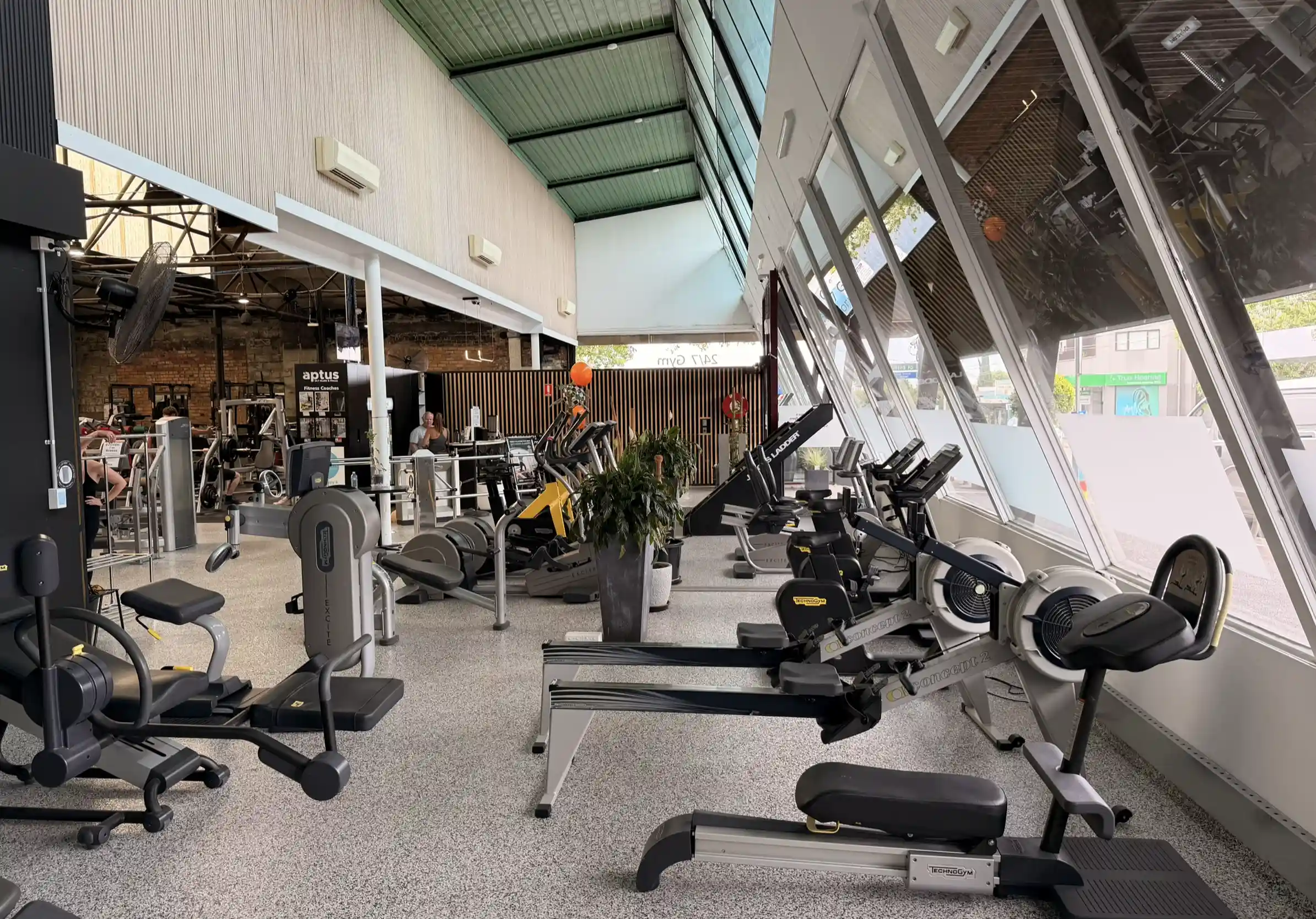 Modern cardio theater at Aptus Health Club Camberwell with premium Life Fitness equipment, natural lighting and personalized training space